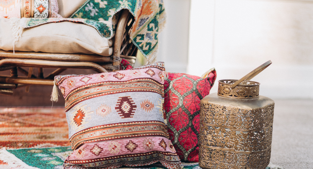 Pillows and rugs in patterned textiles